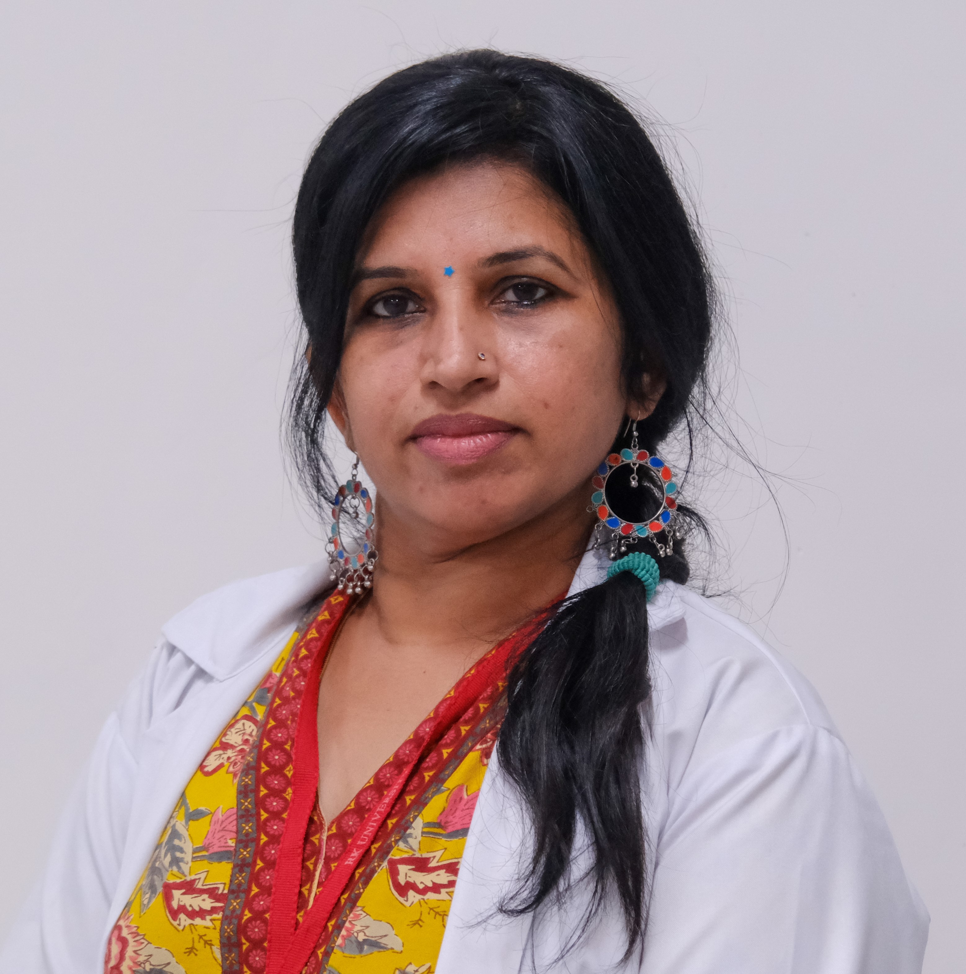 Dr. Devika K
