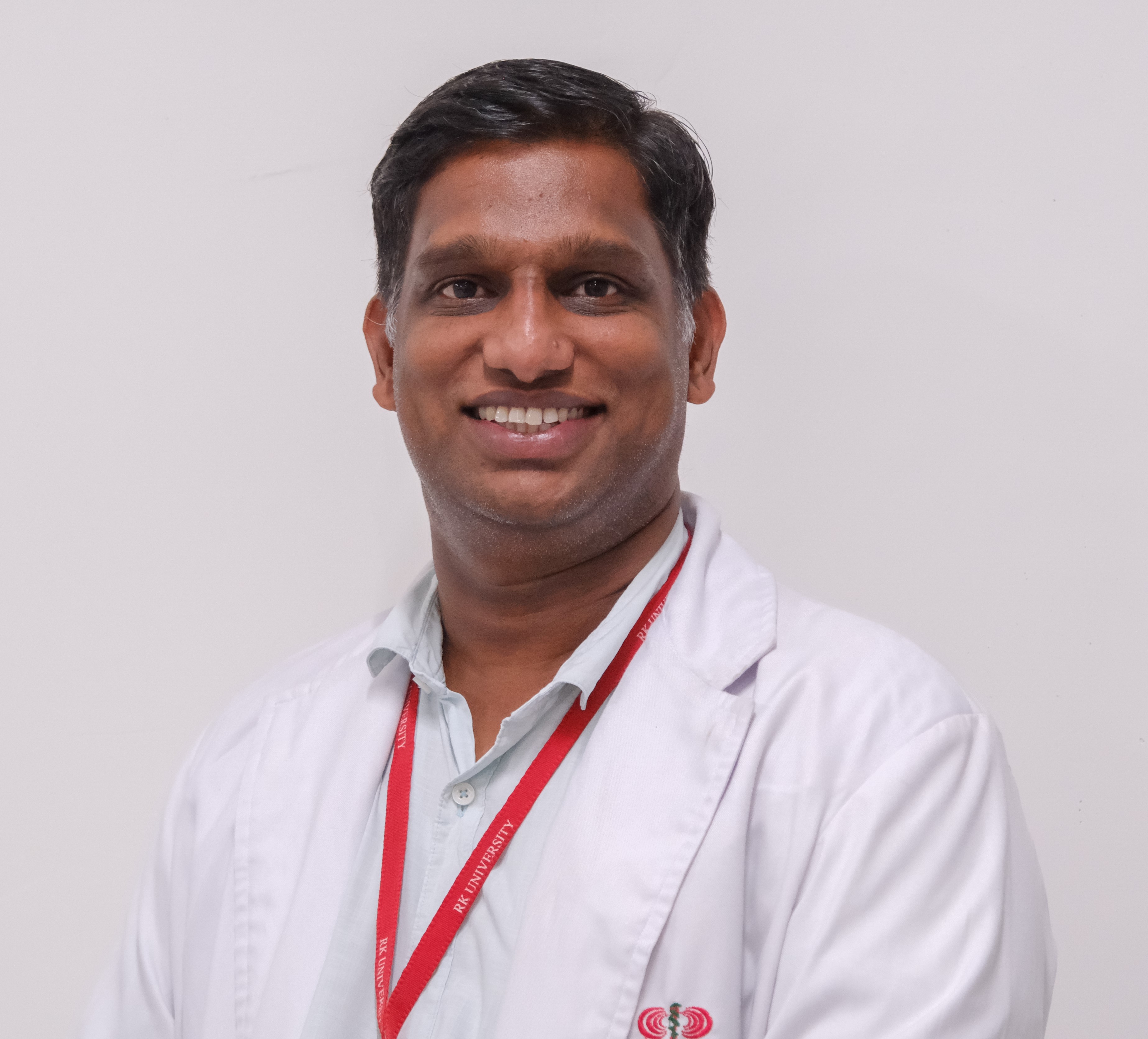 Dr Ragesh T H